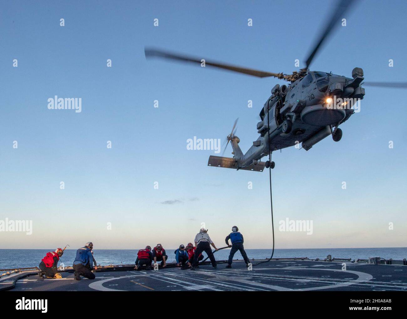 PACIFIC OCEAN (Jan. 6, 2021) U.S. Sailors simulate sending fuel to an ...