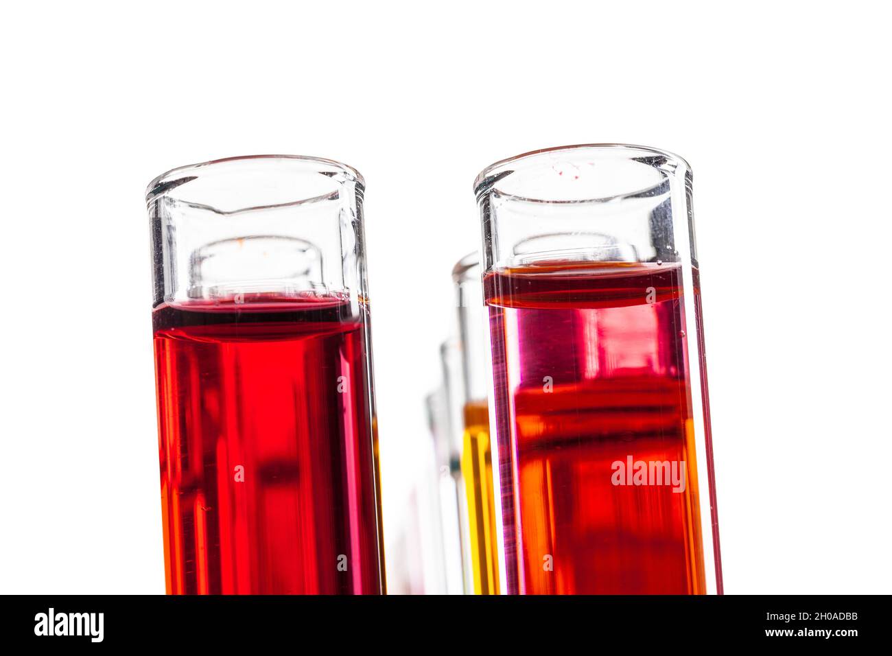 Glass laboratory chemical test tubes with liquid for analysis close up ...
