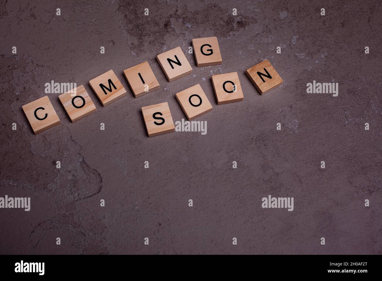 Wooden blocks with text Coming Soon - copyspace Stock Photo