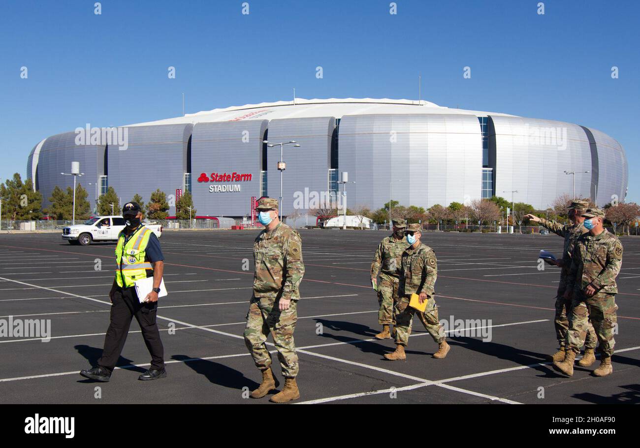 Arizona's Adjutant General Maj. Gen. McGuire walks through COVID Vaccination Site at the State Farm stadium in Glendale Ariz. on 09Jan2021. Arizona National Guard service members continue to support the community during this state of emergency response. Stock Photo