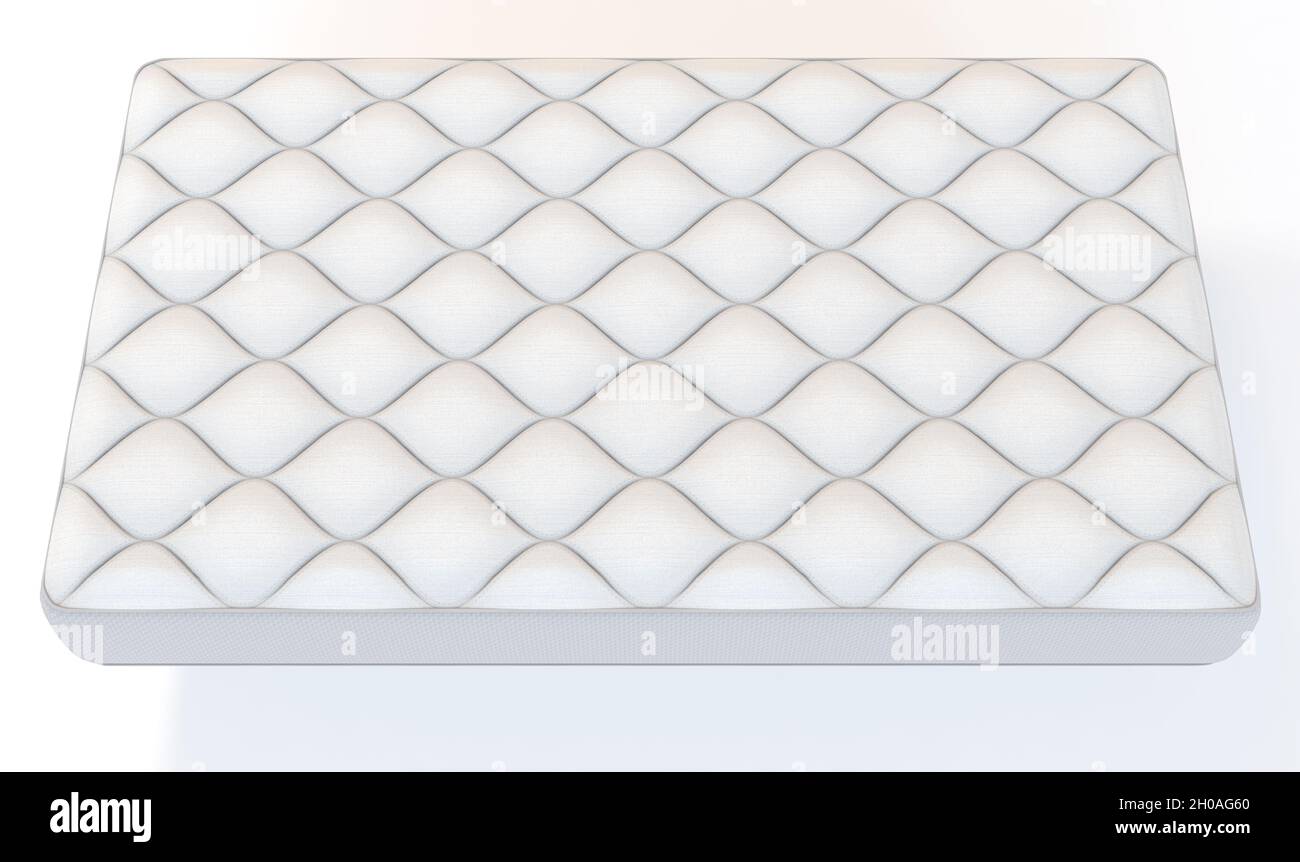 A simple white bed mattress with a decorative topping and fabric sides ...