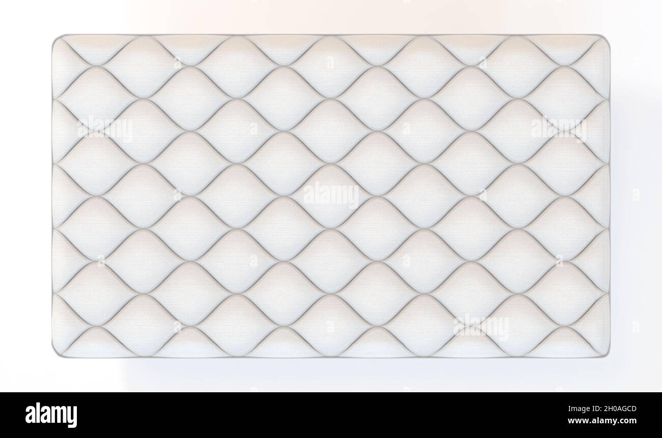 A simple white bed mattress with a decorative topping and fabric sides ...