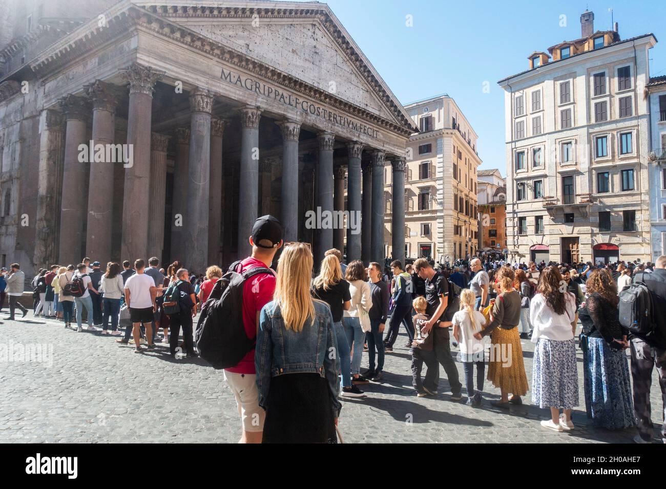 Rome, Italy - October 2021: Tourists standing in a line to visit Pantheon on a sunny Autumn day. Stock Photo