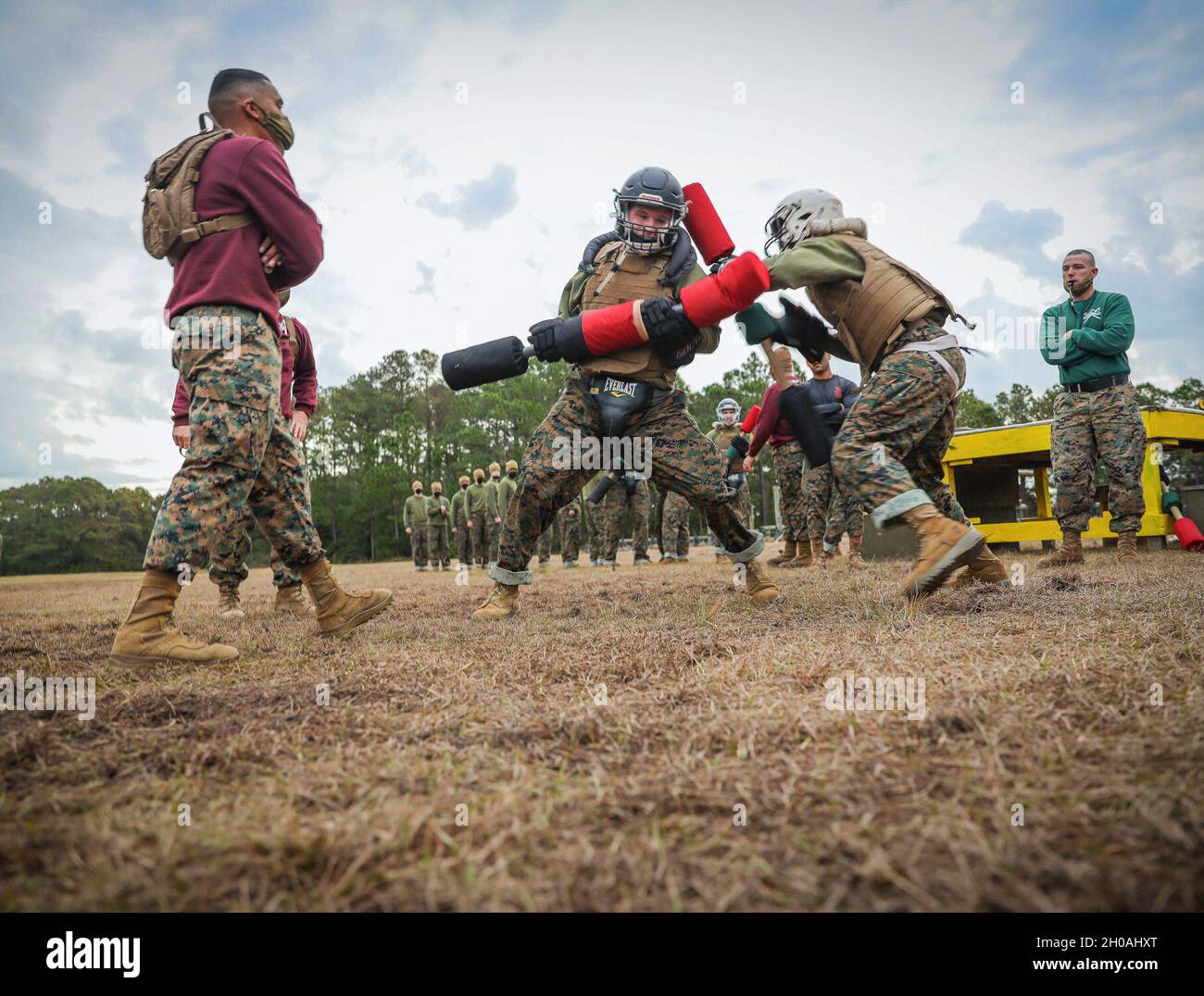 Recruits with Papa Company, 4th Recruit Training Battalion, conduct pugil  sticks bouts aboard Marine Corps Recruit Depot Parris Island, S.C. Jan. 11,  2021. Pugil sticks help recruits practice the fundamentals of Marine