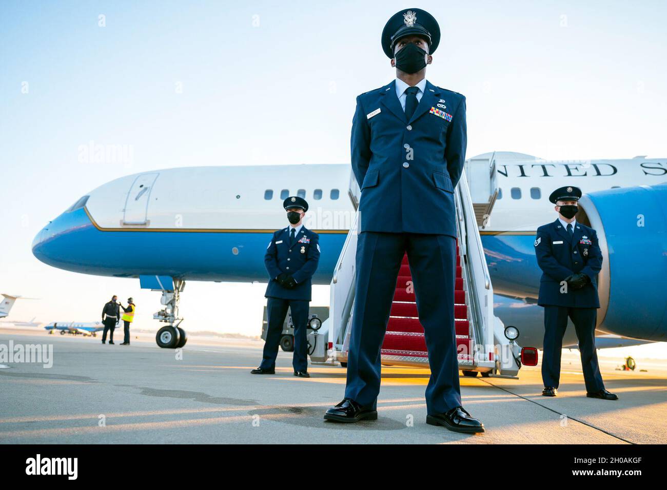 Flight line protocol officer Air Force 1st Lt. Brandon Sublett awaits the arrival of Acting Defense Secretary Chris Miller before the secretary departs for Knoxville, Tenn., at Joint Base Andrews, Md., Jan. 12, 2021. Stock Photo
