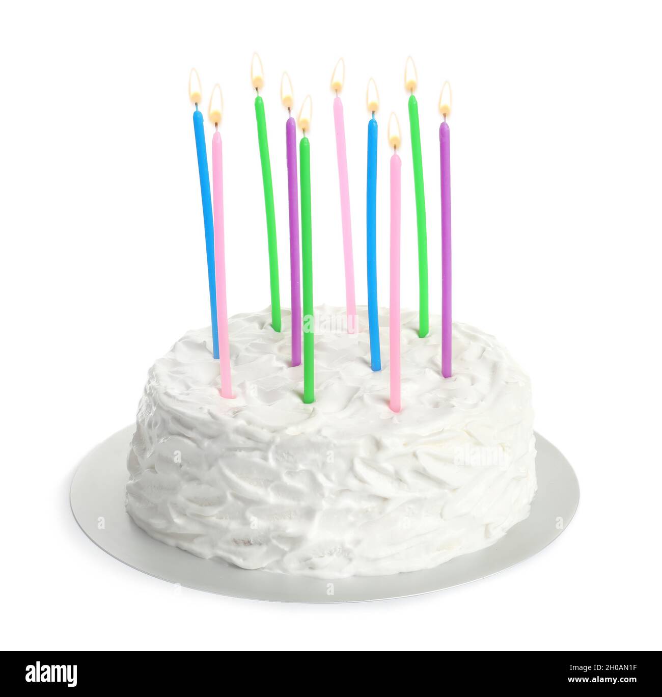Birthday cake with candles on white background Stock Photo - Alamy