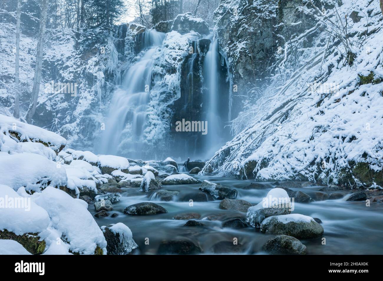 The Heidenbad waterfall in winter, Thur river, Alsace, France Stock Photo