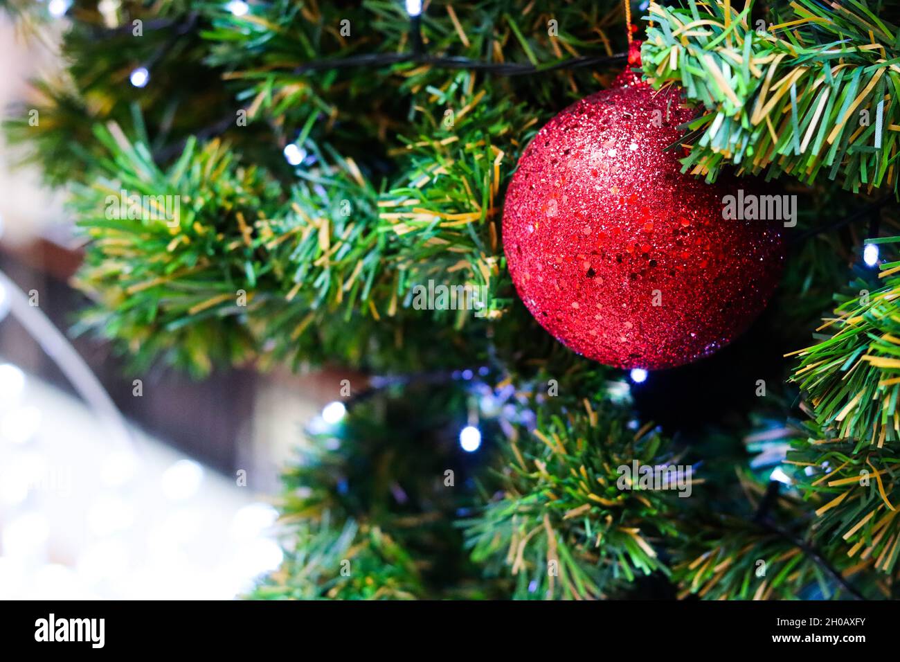 Christmas tree decorated with electric light and colorful balls ...