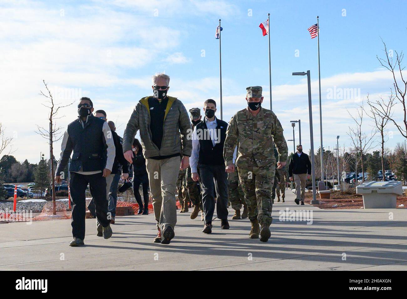 Acting Defense Secretary Chris Miller walks with the commander of North American Aerospace Defense Command and United States Northern Command, Air Force Gen. Glen VanHerck, at NORAD-USNORTHCOM headquarters, Peterson Air Force Base, Colo., Jan. 14, 2021. Stock Photo