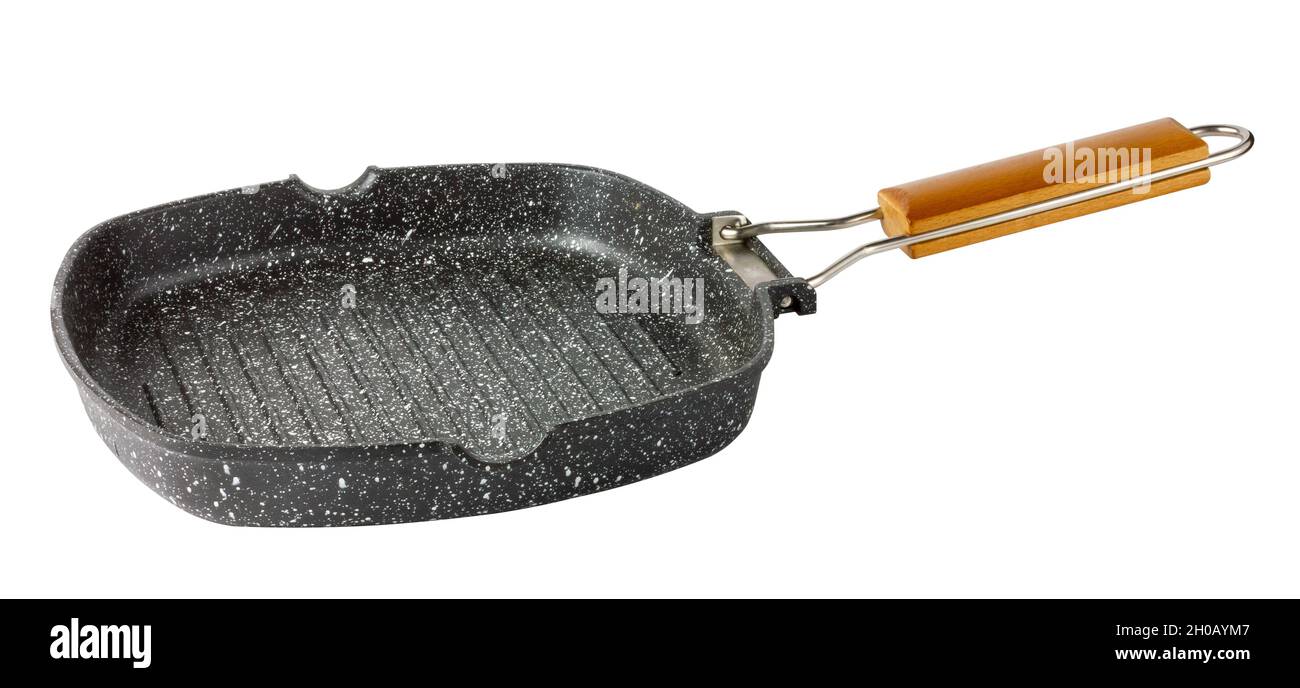 Non-stick frying pan. Frying pan with a wooden handle. Isolate on a white background. Stock Photo