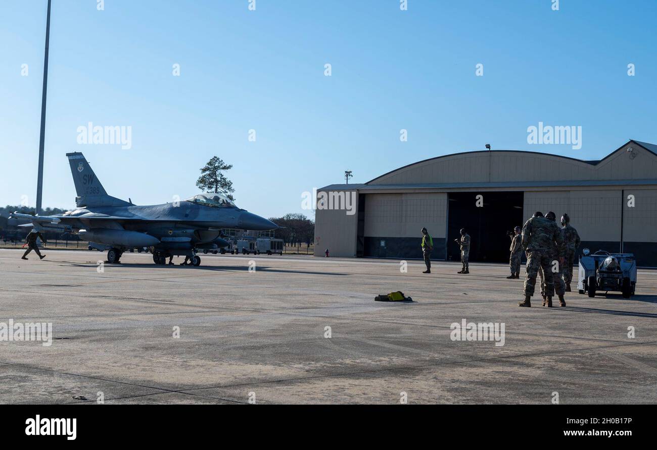U.S. Airmen assigned to the 20th Maintenance Group (MXG) weapons flight ...