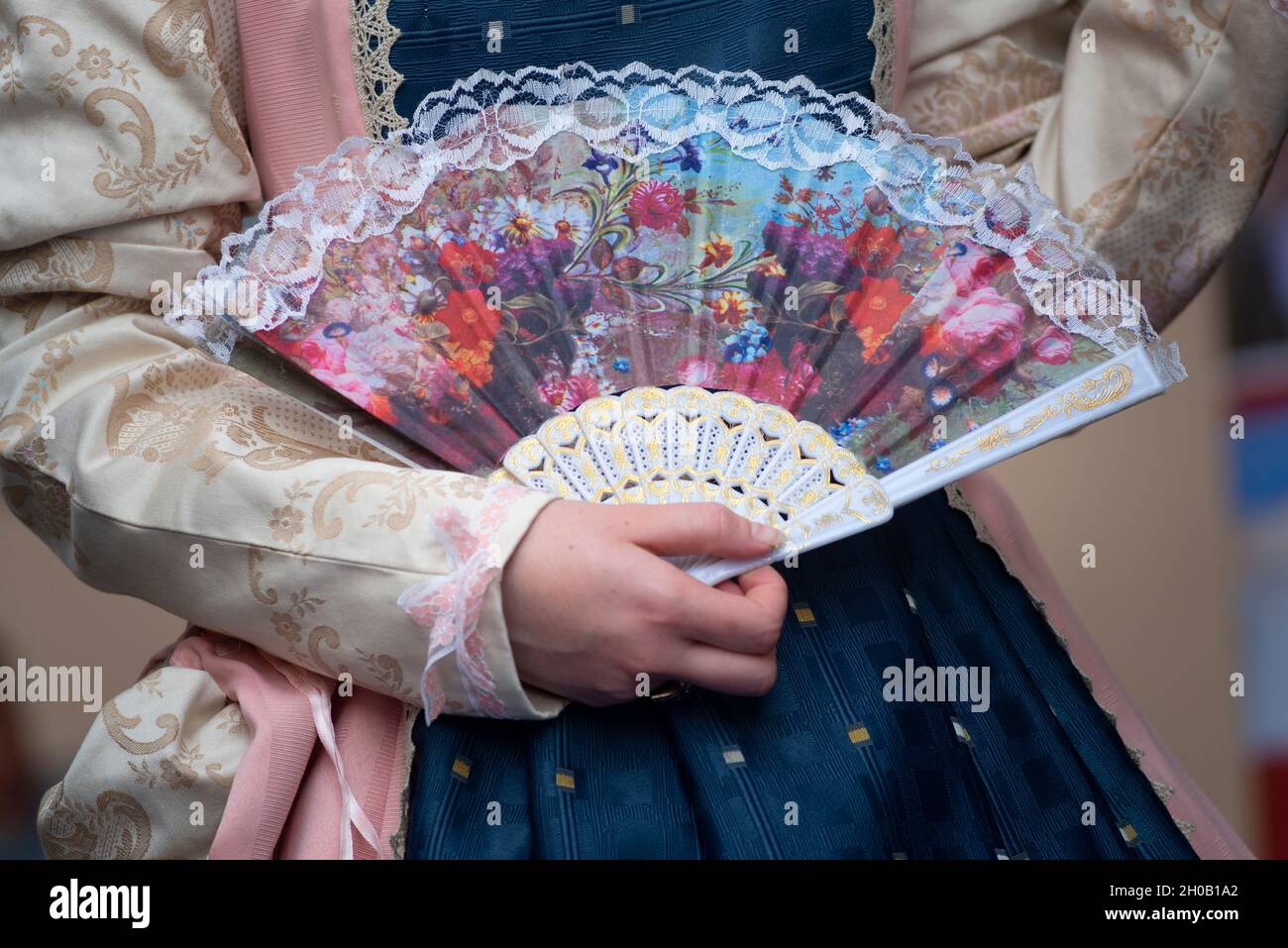 Italy, Lombardy, Historical Recalling, Woman Holding Folding Fans Stock Photo