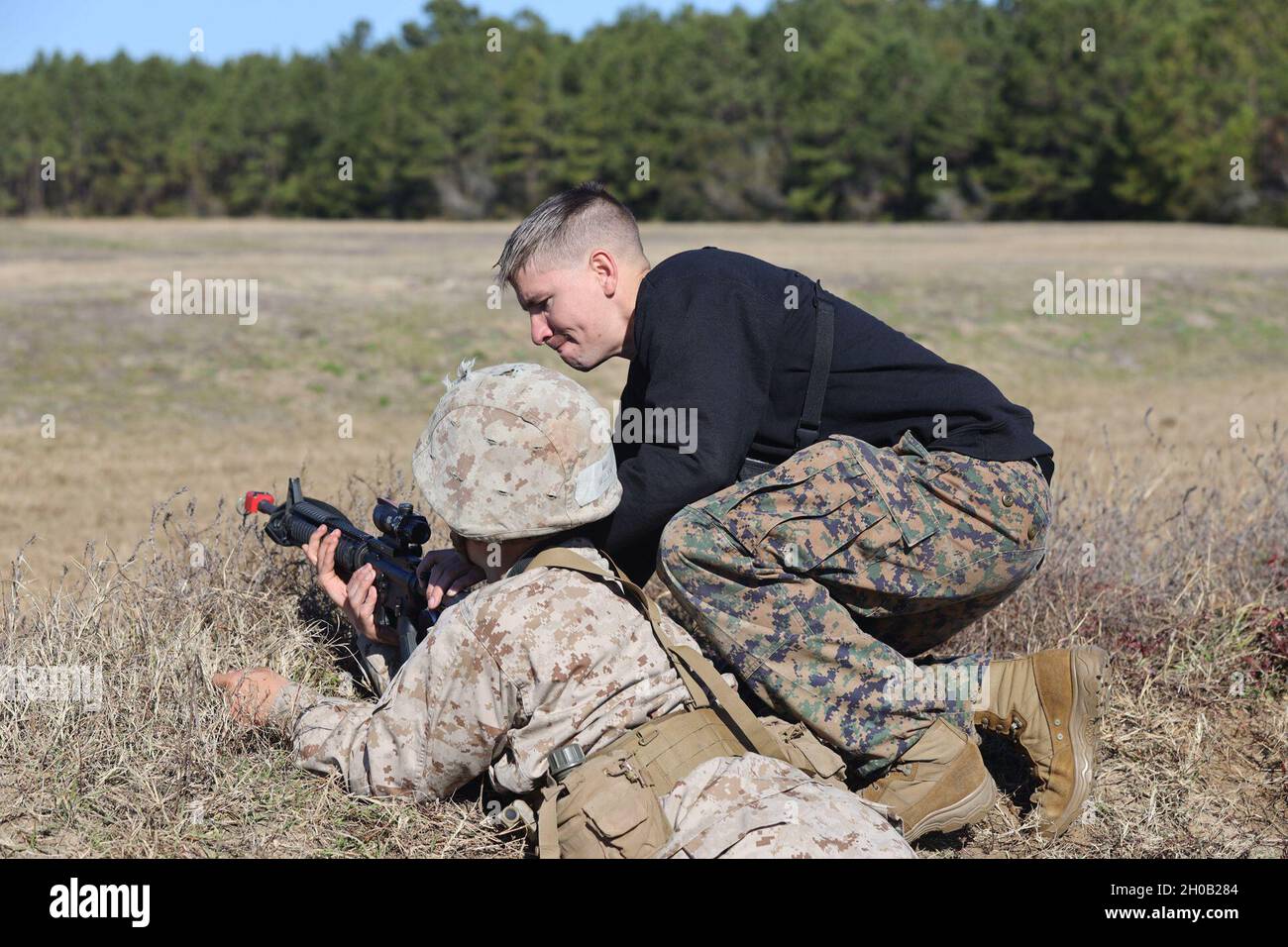 Sgt. Jacob Freeman with Field Training Company, Weapons and Field Training Battalion, performs corrective action on an M16A4 service rifle aboard Marine Corps Recruit Depot Parris Island, S.C., Jan. 14, 2021. Corrective action is used to assist the rifle in loading the rounds correctly. Stock Photo