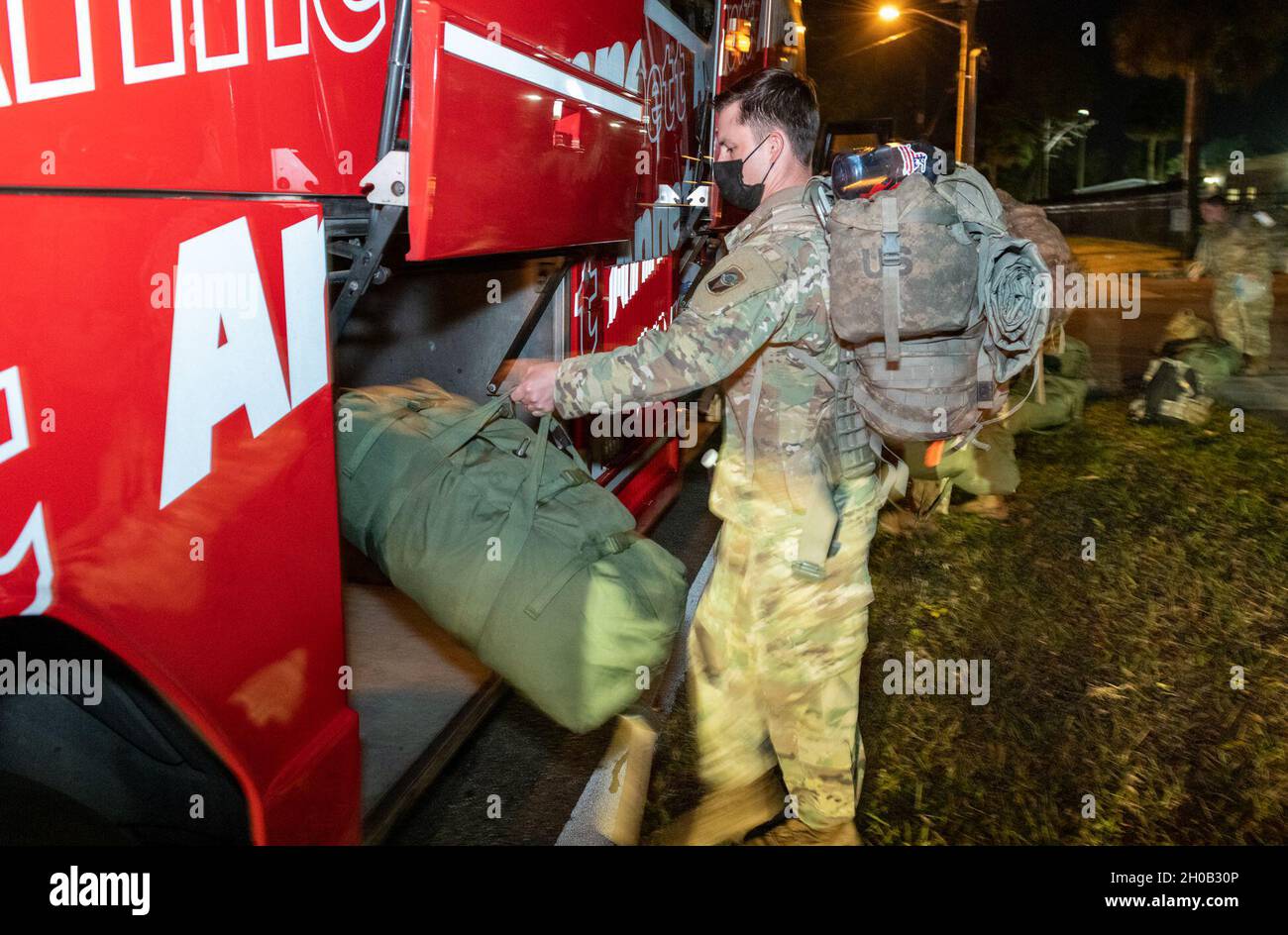 Florida Soldiers with 2nd Battalion, 124th Infantry Regiment, headquartered in Orlando, start their journey to support the 59th presidential inauguration Jan. 15, 2021. Approximately 600 Soldiers and Airmen from the Florida National Guard will be on-hand in the nation’s capital working with local authorities on missions like security, traffic control and communications support. Stock Photo