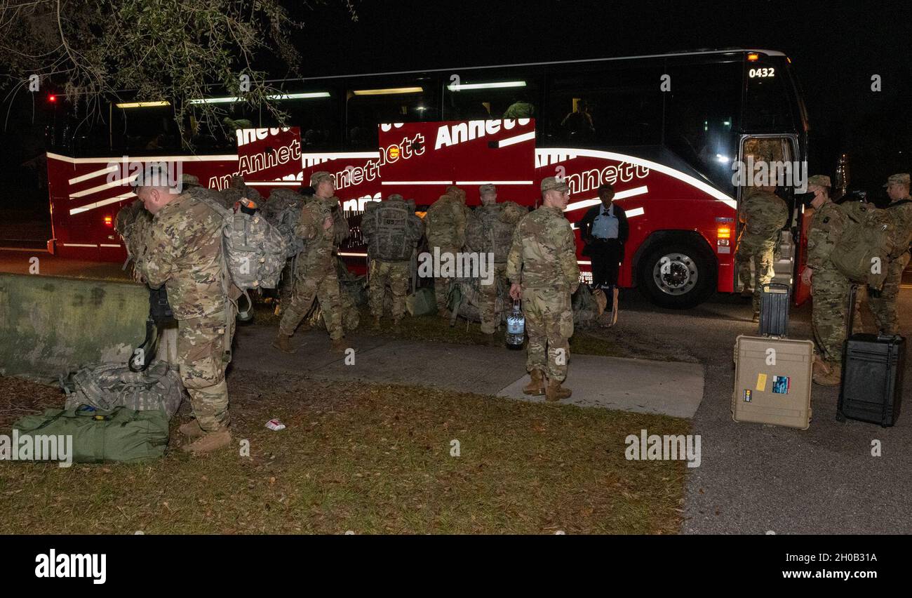 Florida Soldiers with 2nd Battalion, 124th Infantry Regiment, headquartered in Orlando, start their journey to support the 59th presidential inauguration Jan. 15, 2021. Approximately 600 Soldiers and Airmen from the Florida National Guard will be on-hand in the nation’s capital working with local authorities on missions like security, traffic control and communications support. Stock Photo