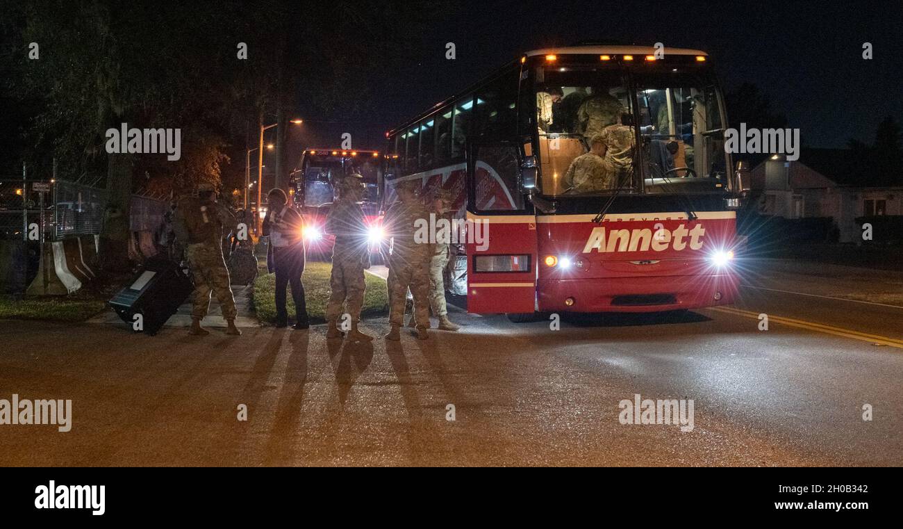 Florida Soldiers with 2nd Battalion, 124th Infantry Regiment, headquartered in Orlando, start their journey to support the 59th presidential inauguration Jan. 15, 2021. Approximately 600 Soldiers and Airmen from the Florida National Guard will be on-hand in the nation’s capital working with local authorities on missions like security, traffic control and communications support. Stock Photo