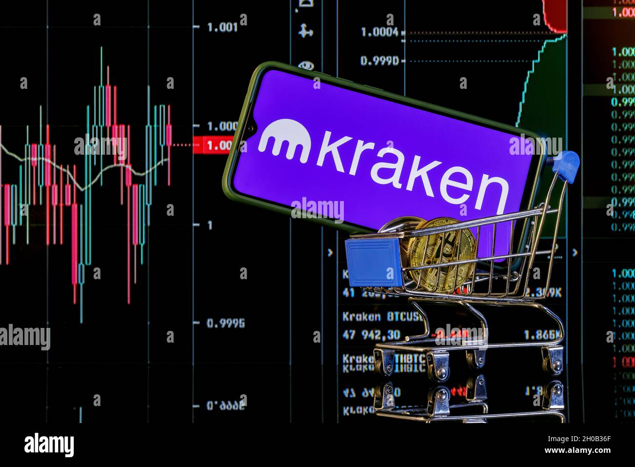Kraken is cryptocurrency exchange. A smartphone with the Kraken logo in  shopping cart on the background of the live trading webpage. Kraken  dashboard Stock Photo - Alamy