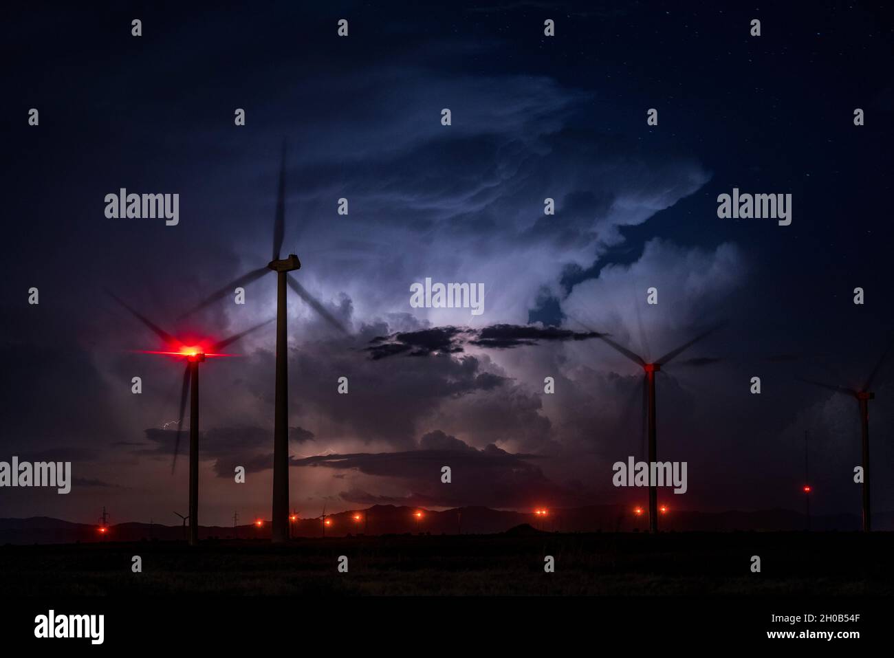 Isolated thunderstorm on a starry night. Thunderstorm coming from the