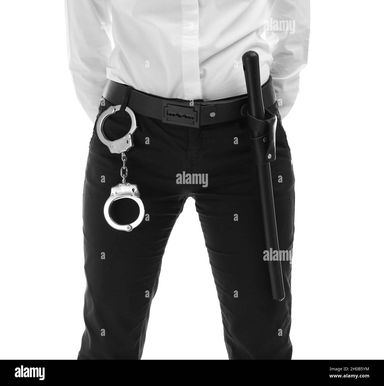 Female security guard with handcuffs and police baton on white