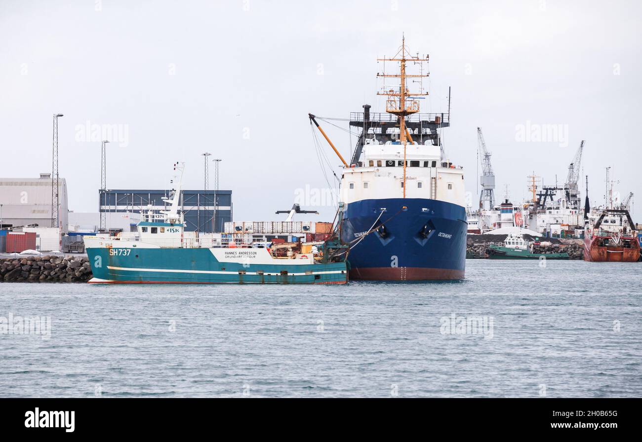 Hafnarfjordur, Iceland - April 4, 2017: Fishing vessels are moored in port of Hafnarfjordur Stock Photo