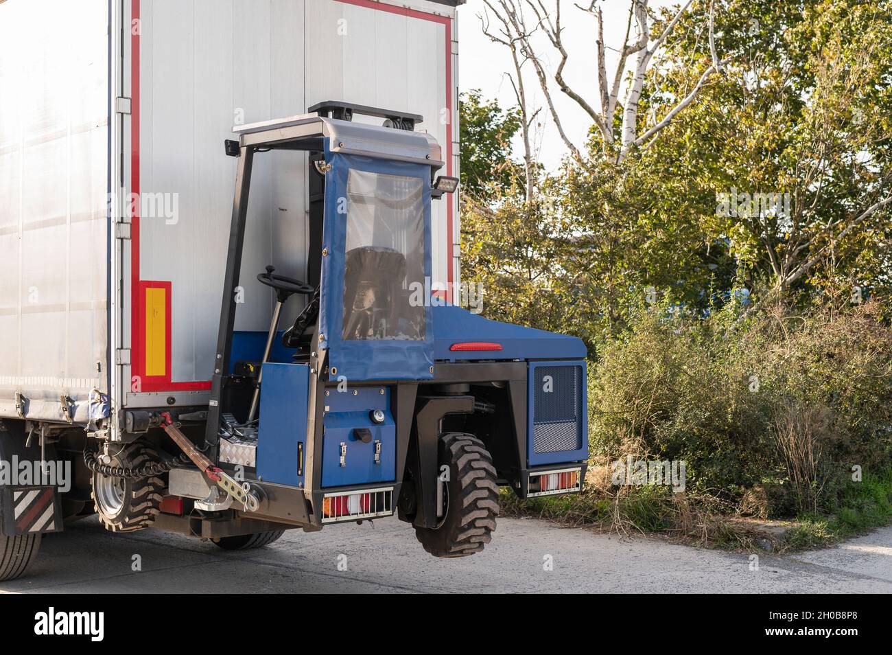 A truck-mounted forklift is attached to the truck Stock Photo