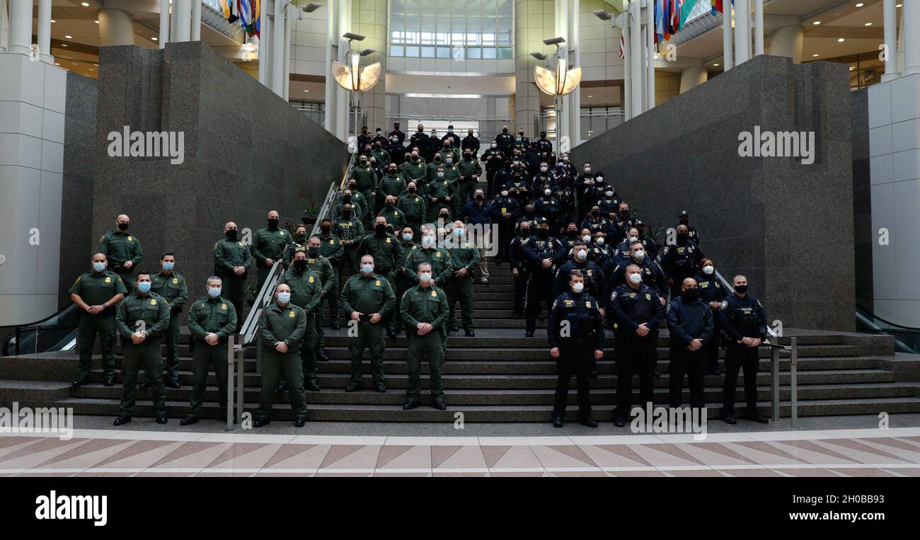Acting Department of Homeland Security Secretary Pete Gaynor, center, poses with U.S. Customs and Border Protection officers and agents along with officers of the Federal Protective Service as they prepare to set out on their assignments around the Capitol area to assist in the unprecedented security operation to ensure the safety of the 59th Presidential Inauguration, January 17, 2021. CBP Stock Photo