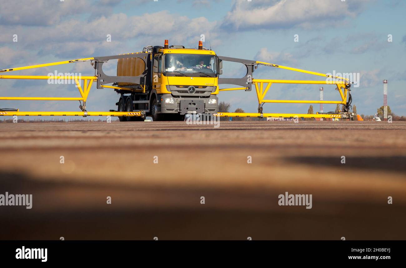 Kyiv, Ukraine - November 05, 2019: Airport division snow removal vehicles. Grader with a bucket JetBroom Boschung Multifunctional high-performance cleaning system for highways. Defroster Stock Photo