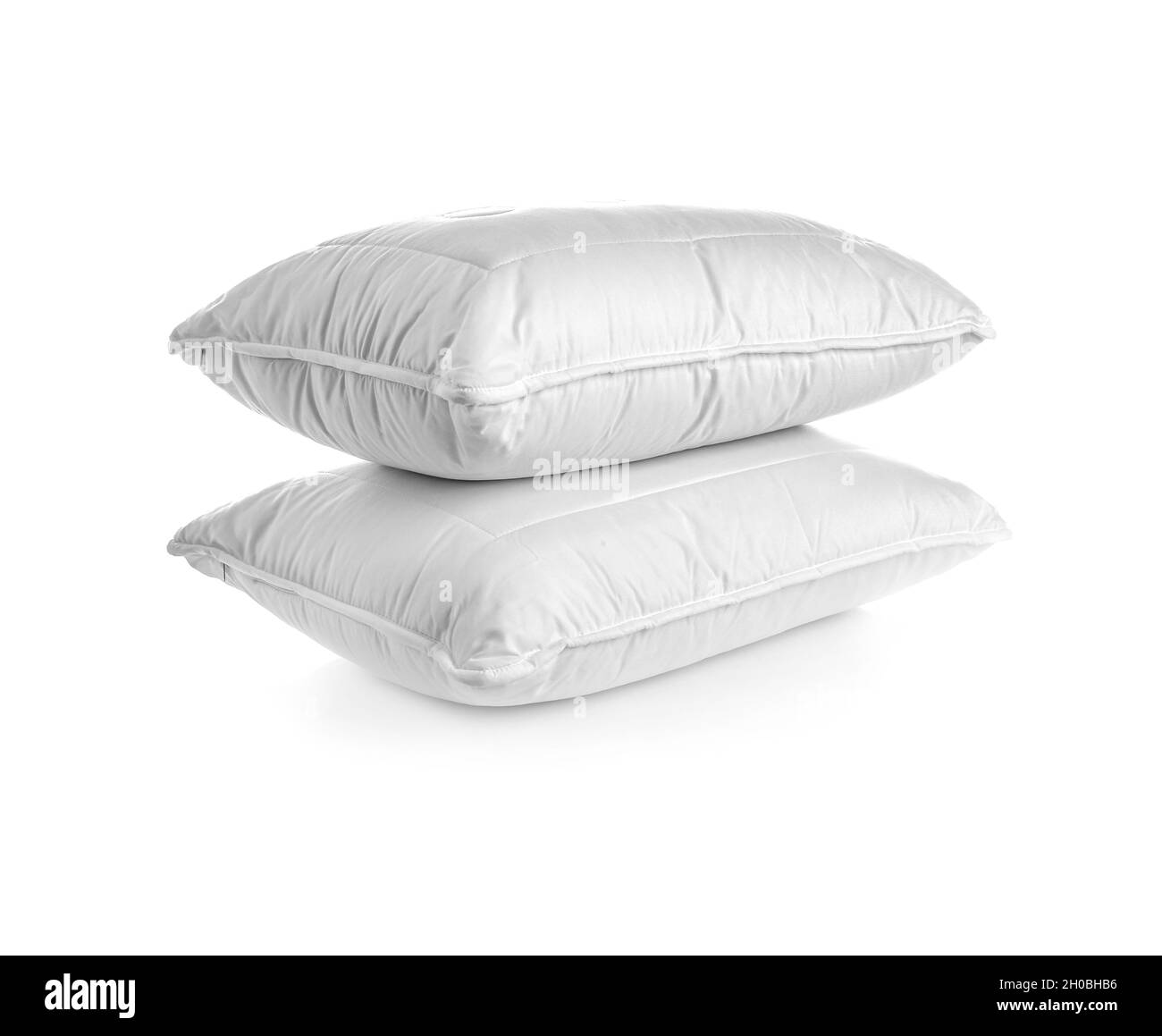 Clean soft bed pillows on white background Stock Photo Alamy
