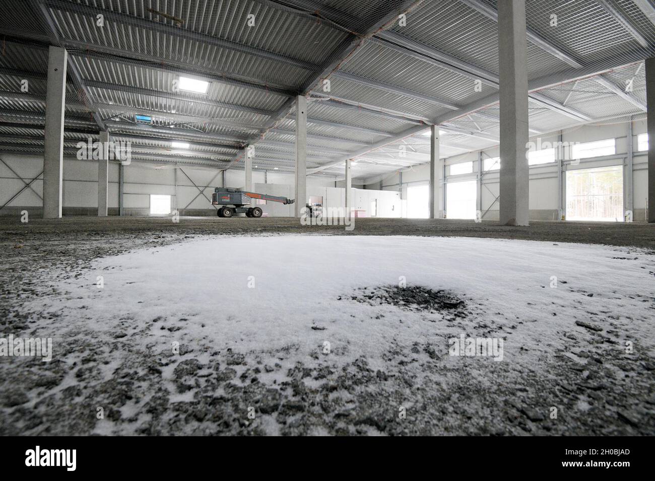 The photo shows the construction site for the future Training Support