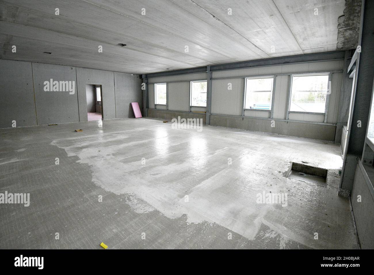 The photo shows the construction site for the future Training Support