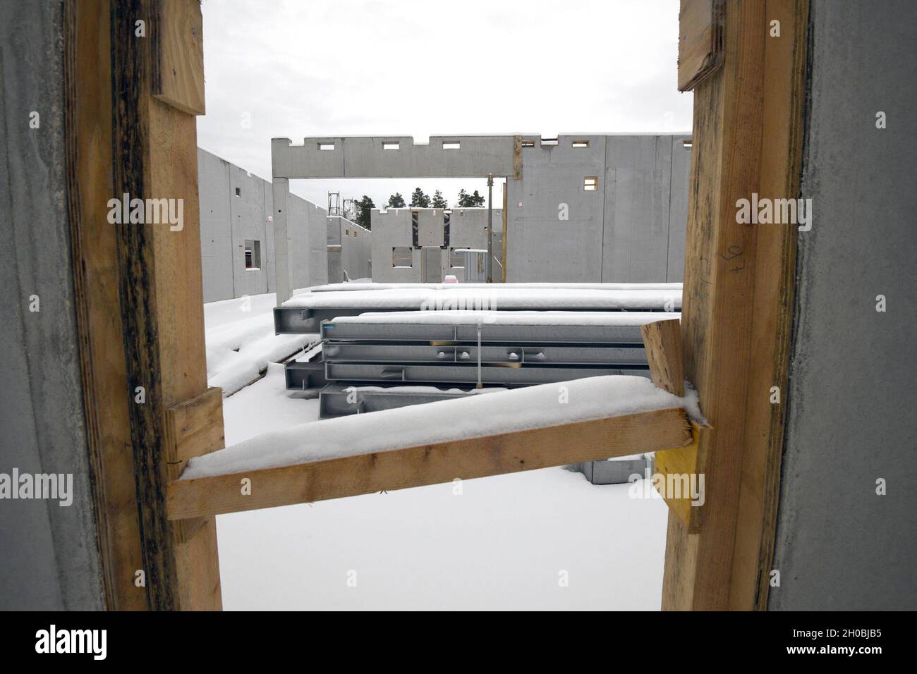 The photo shows the construction site for the future Training Support