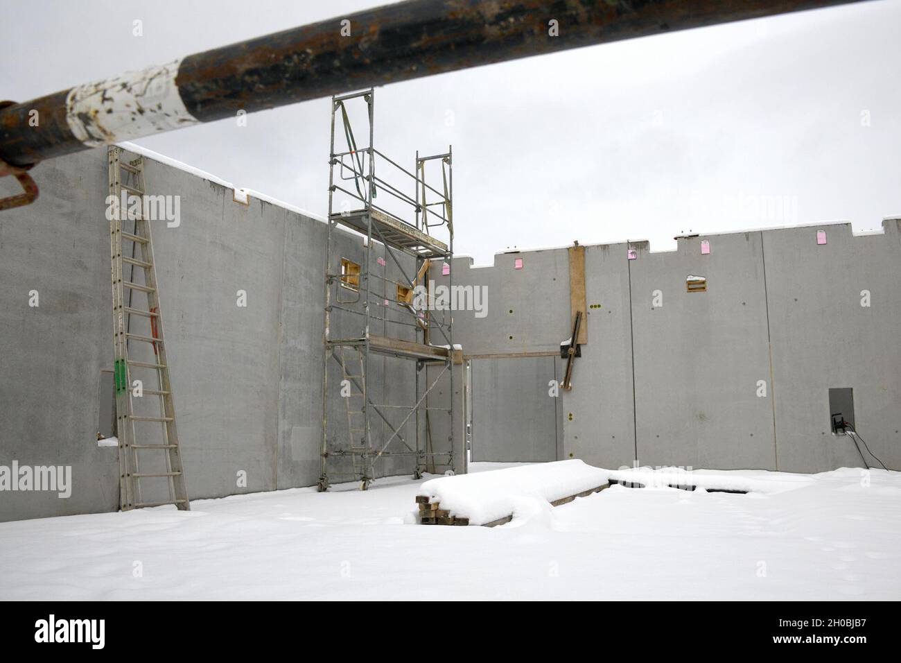 The photo shows the construction site for the future Training Support
