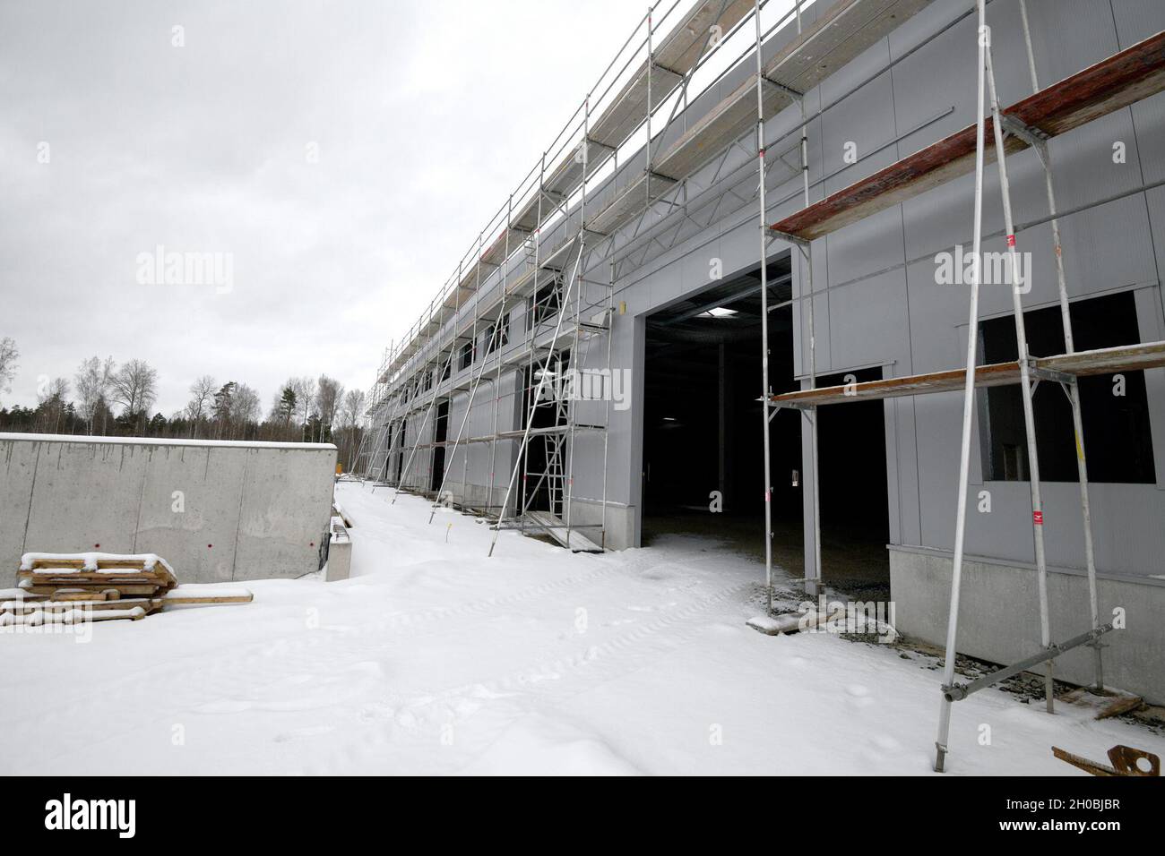 The photo shows the construction site for the future Training Support