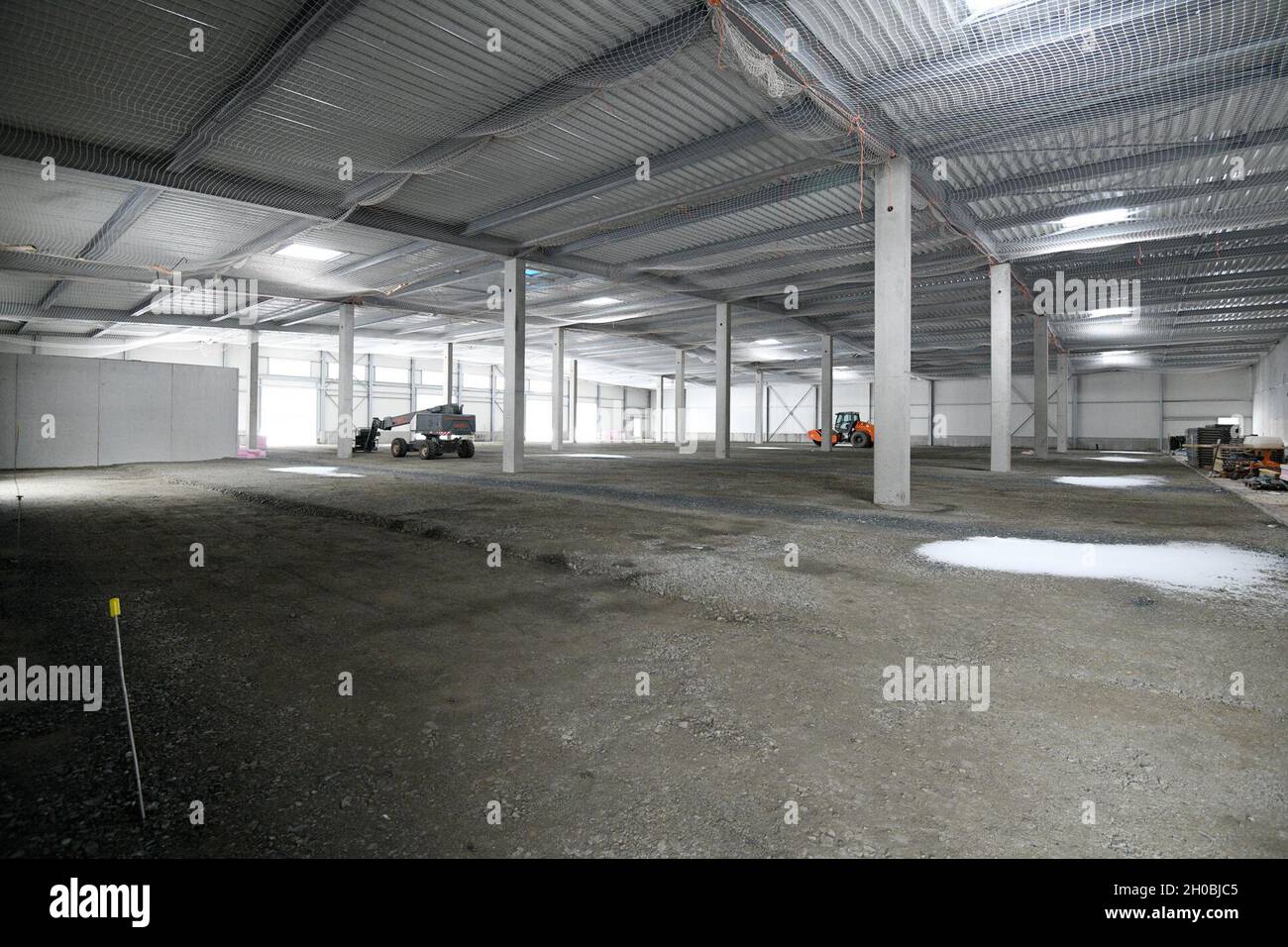 The photo shows the construction site for the future Training Support