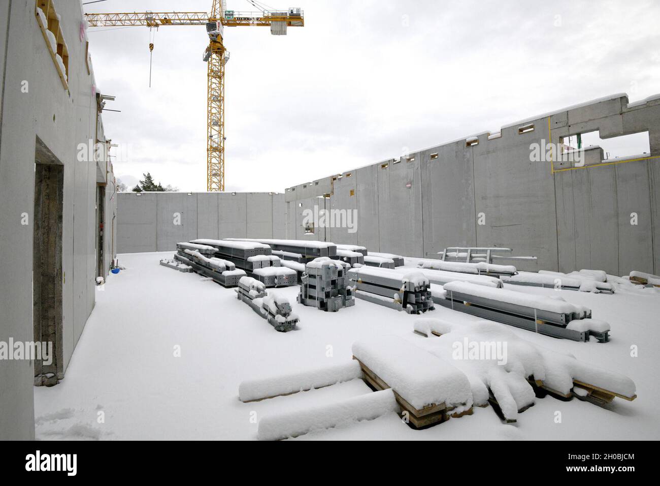 The photo shows the construction site for the future Training Support