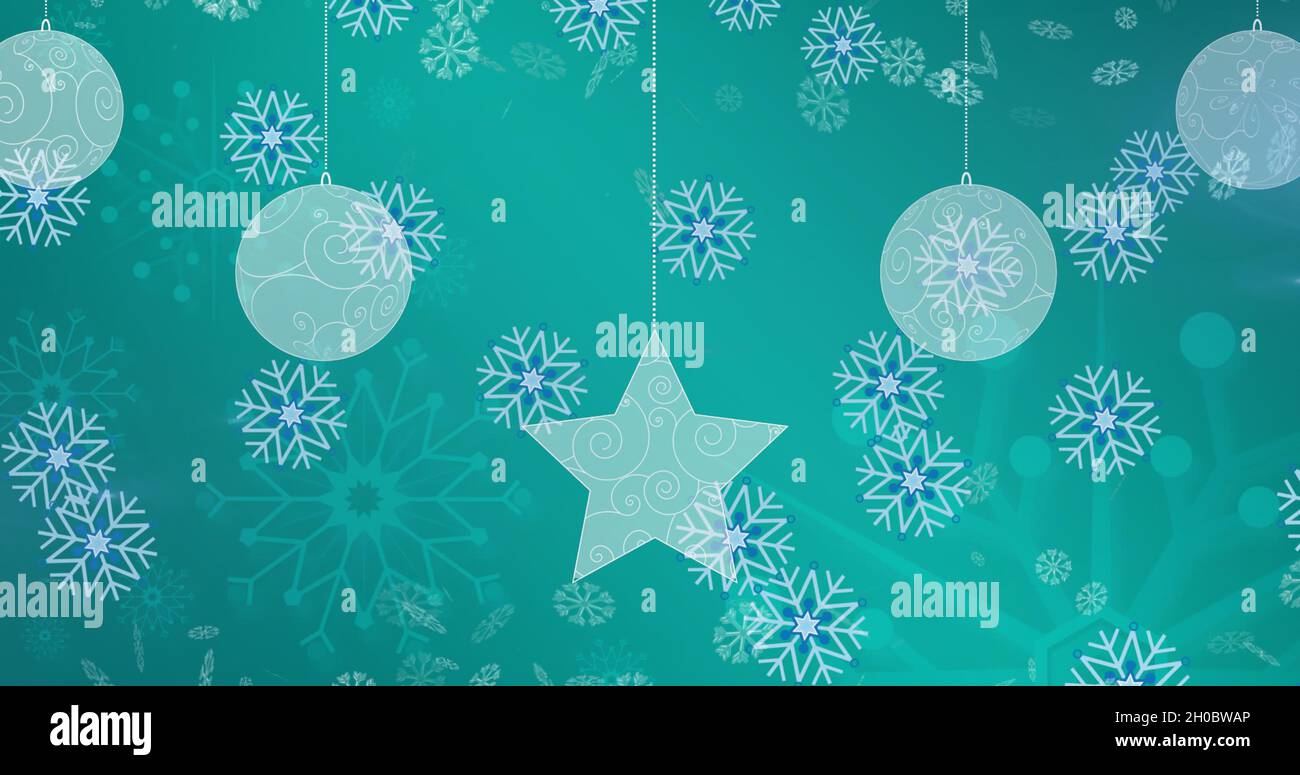 Image of christmas balls over snowflakes on blue background Stock Photo ...