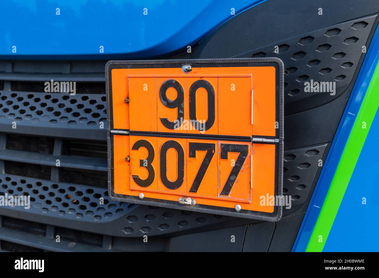 orange-warning-sign-for-dangerous-goods-here-90-environmentally-hazardous-substance-or-various-hazardous-substances-and-3077-for-environmentally-haz-2H0BWME.jpg