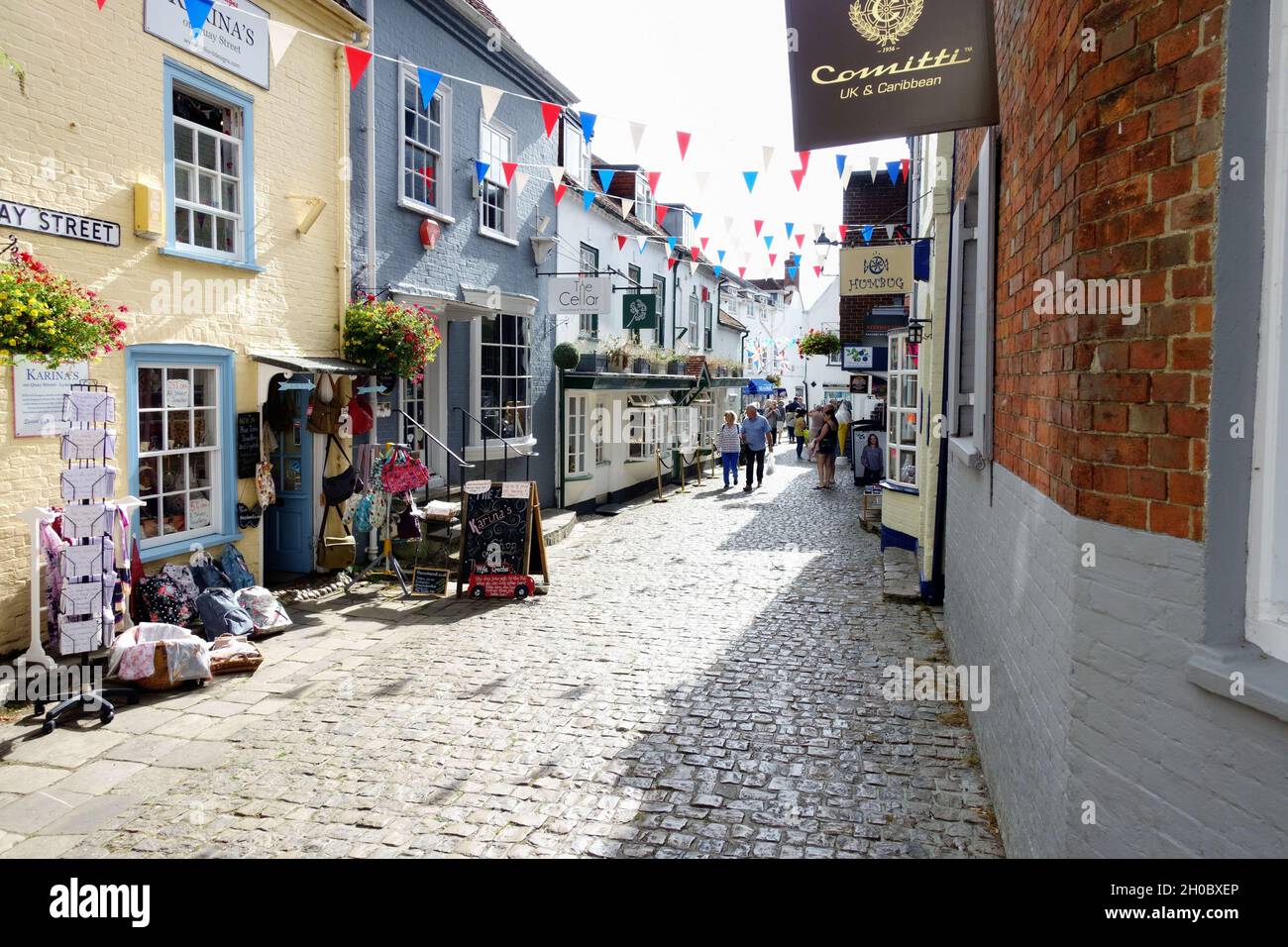 Shoppers in cobbled Quay Street, Lymington Stock Photo