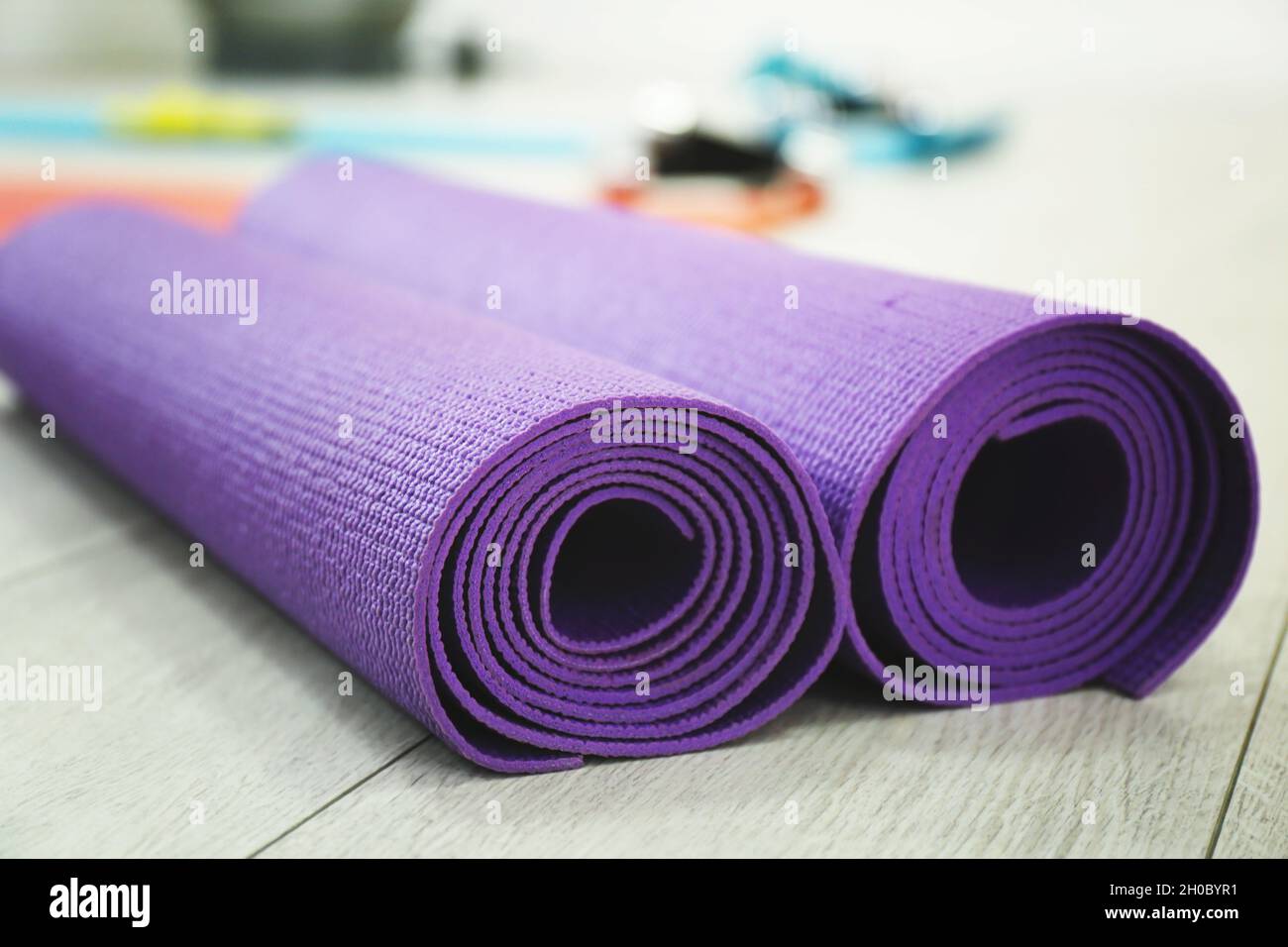Rolled yoga mats indoors, closeup. Physiotherapy center Stock Photo Alamy