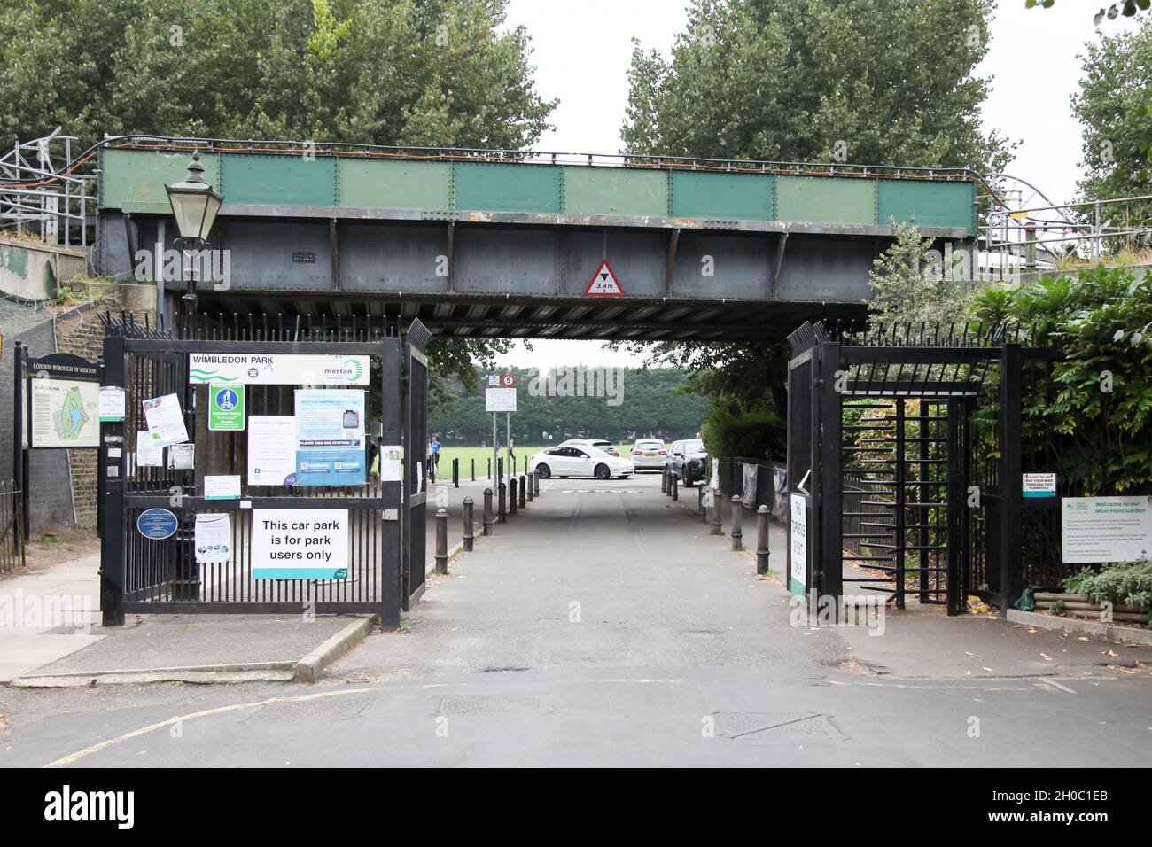 Revelstoke Road car park entrance to Wimbledon Park showing railway