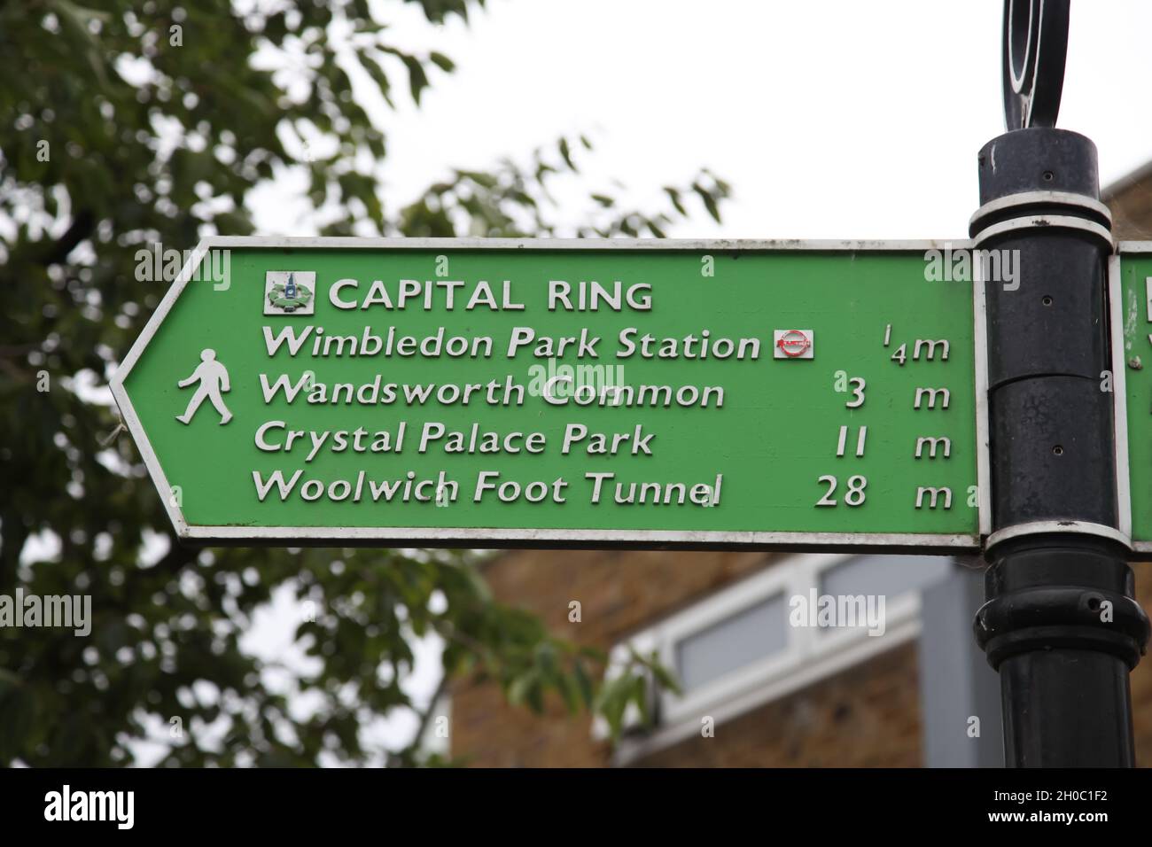 Wimbledon Park sign post for Capital Ring, Station, Wandsworth Common, Crystal Palace, Woolwich Foot Tunnel, September 2021 Stock Photo