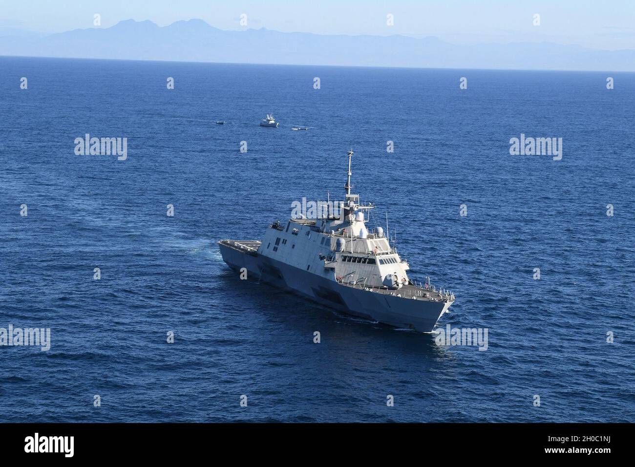 210121-N-RC007-1001   EASTERN PACIFIC OCEAN (Jan 21, 2021) The Freedom-class littoral combat ship USS Freedom (LCS 1) executed a tri-lateral passing exercise (PASSEX) with El Salvadorian  and Guatemalan navies  Jan. 21, 2021. Freedom is deployed to the U.S. 4th Fleet area of operations to support Joint Interagency Task Force South’s mission, which includes counter illicit drug trafficking in the Caribbean and Eastern Pacific. Stock Photo