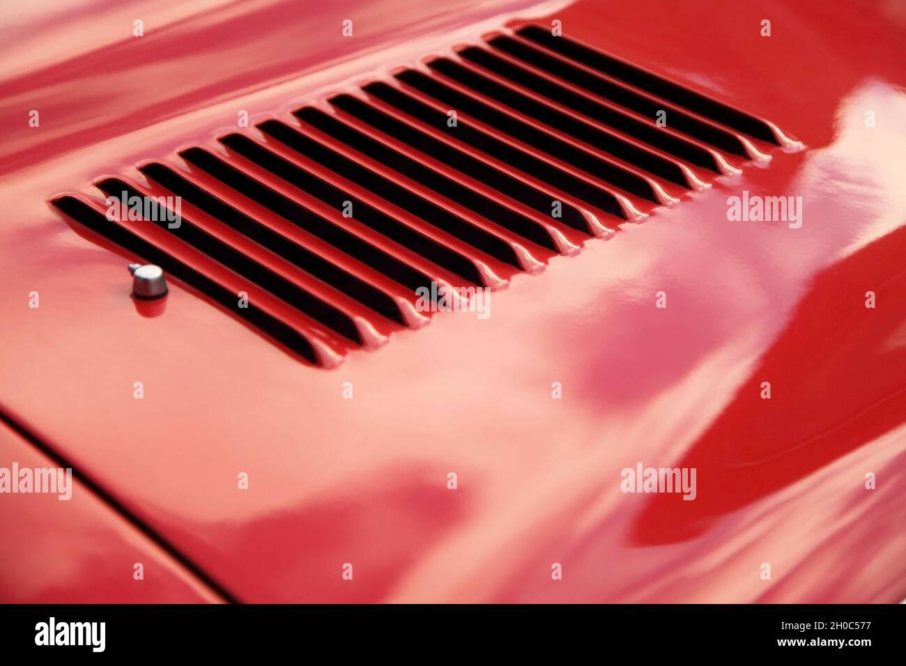 louvres of red Etype Jaguar sportscar Stock Photo Alamy