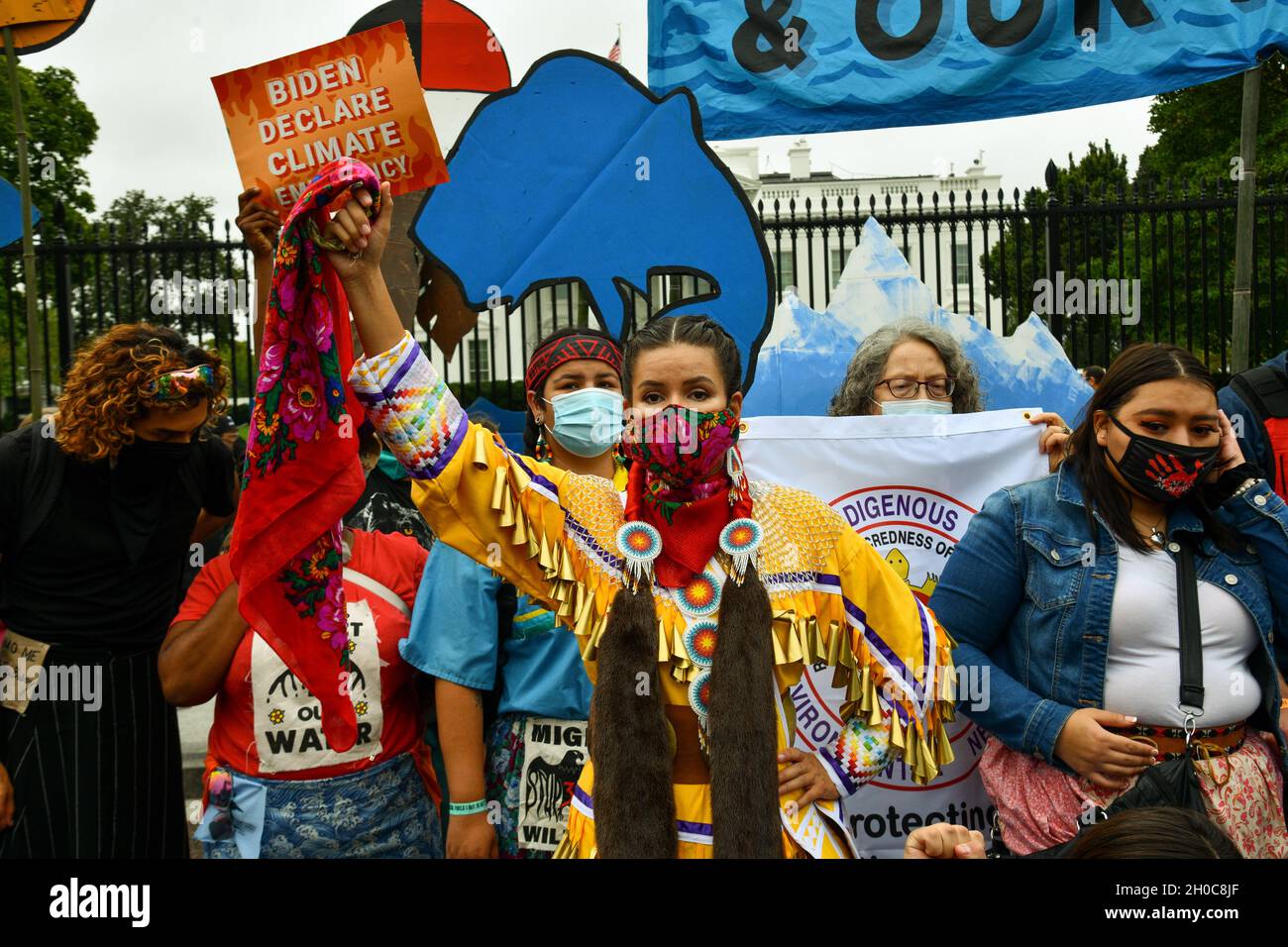 Washington, USA. 11th Oct, 2021. Environmental activists, led by indigenous peoples groups, protest at the White House to call on the U.S. government to combat climate change in Washington, DC on October 11, 2021. (Photo by Matthew Rodier/Sipa USA) Credit: Sipa USA/Alamy Live News Stock Photo
