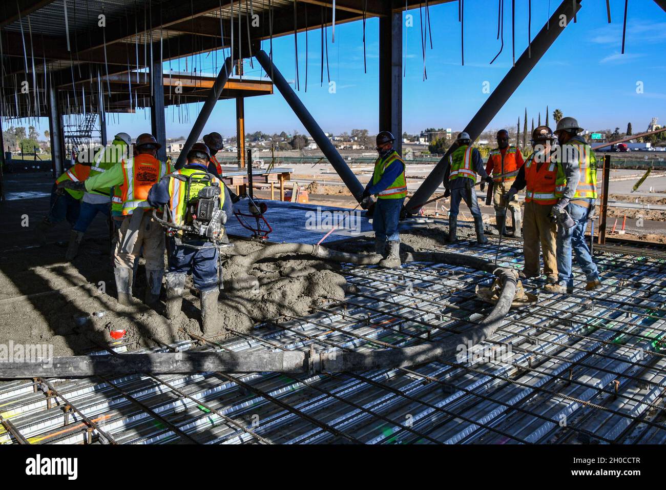 Contractors with the U.S. Army Corps of Engineers place concrete on the  second floor of the future Stockton VA Community Based Outpatient Clinic in  Stockton, California January 21, 2021. The U.S. Army