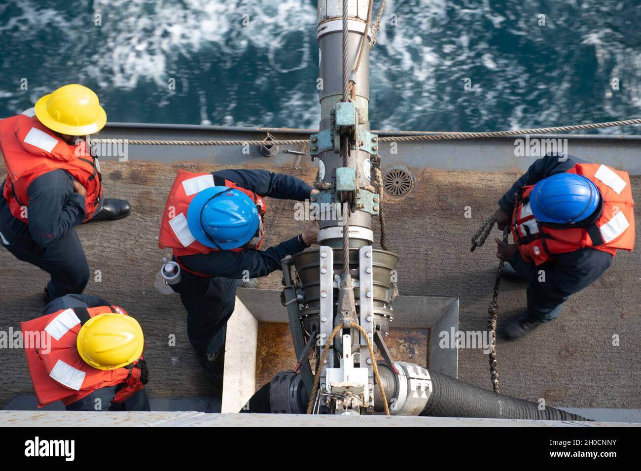 210124 N Fo865 1176 Arabian Gulf Jan 24 2020 U S Navy Boatswain S Mates Secure A Fuel Hose Aboard The Amphibious Transport Dock Ship Uss San Diego Lpd 22 During A Replenishment At Sea With The Dry