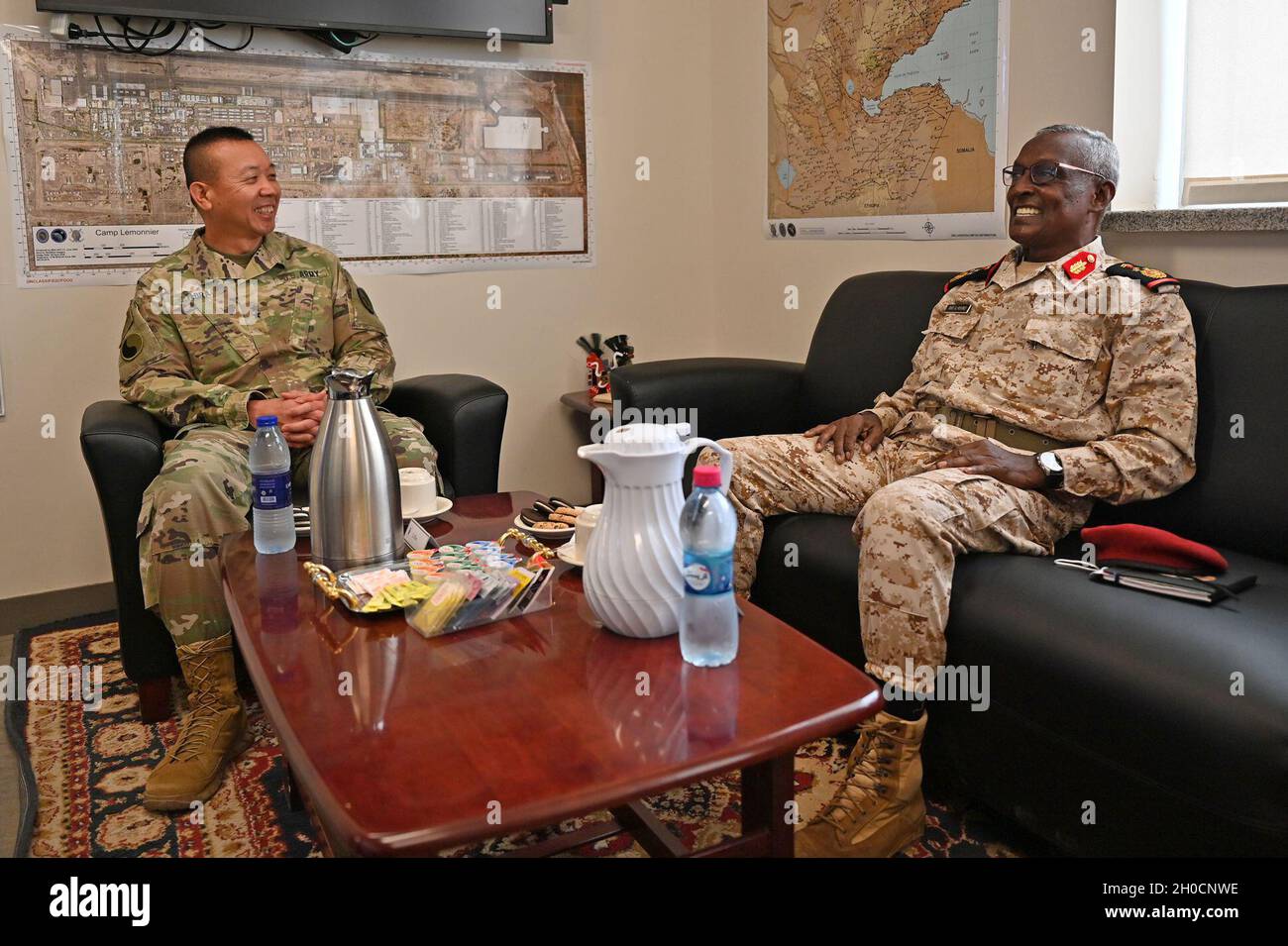 U.S. Army Maj. Gen. Lapthe Flora, commanding general, Combined Joint Task Force – Horn of Africa (CJTF-HOA), meets with Djiboutian Gen. Taher Ali Mohamed, Djiboutian Armed Forces Chief of Staff, at CJTF-HOA headquarters, Jan. 25, 2021. The meeting allowed conversations to talk through discussion points for the upcoming U.S. Africa Command hosted African Chief of Defense conference. Stock Photo