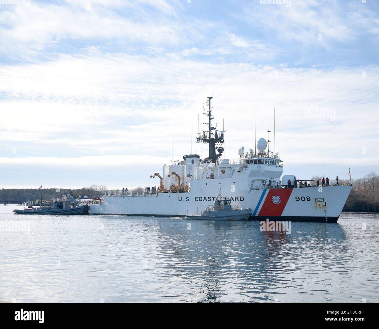 U.S. Coast Guard cutter and crew prepare to moor at their homeport in ...