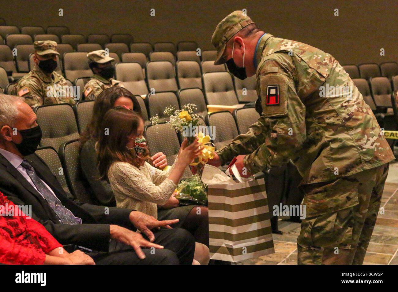 Command Sgt. Maj. Raymond J. Ramirez, accepts the colors from Col ...