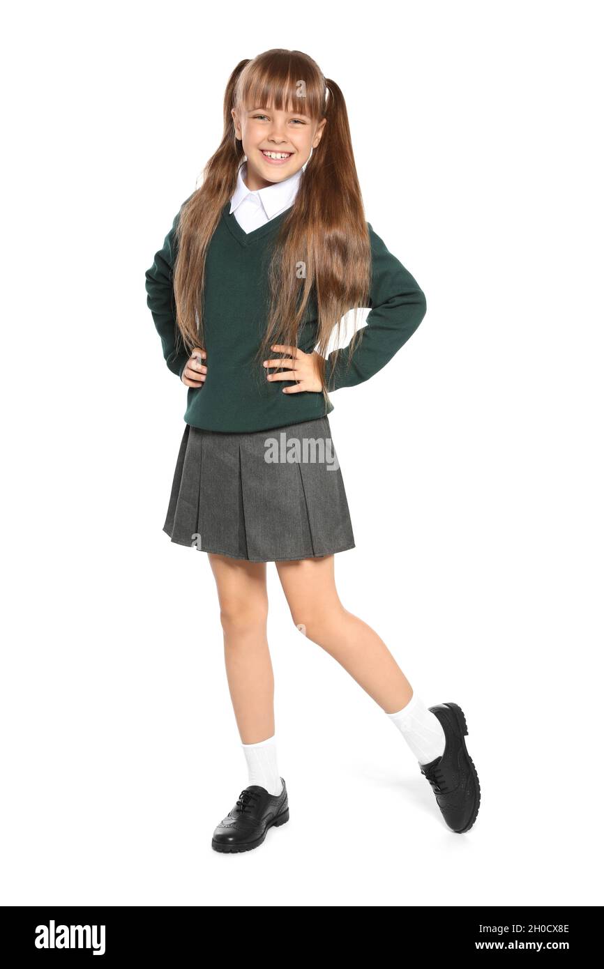 Little girl in stylish school uniform on white background Stock Photo -  Alamy